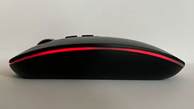 a black wireless mouse from the side