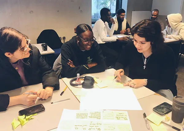 my two classmates and I working on the project prototype